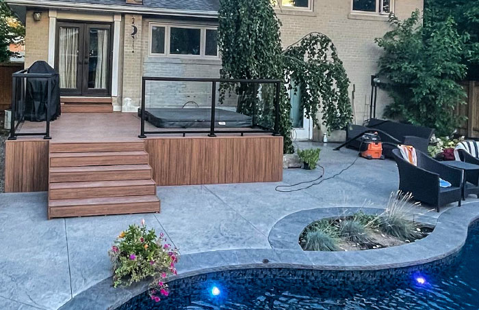 VanKuikConstruction-2024-backyard-interlock-stone-pool2