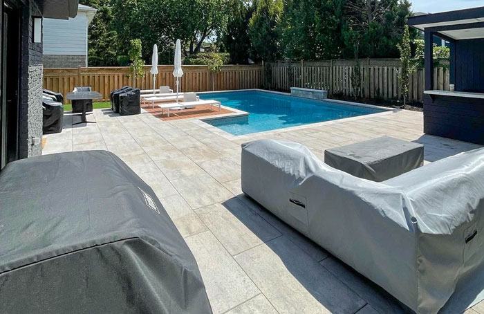 VanKuikConstruction-large-stone-patio-pool-bar